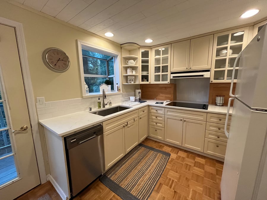 Full size refrigerator, microwave and new dishwasher