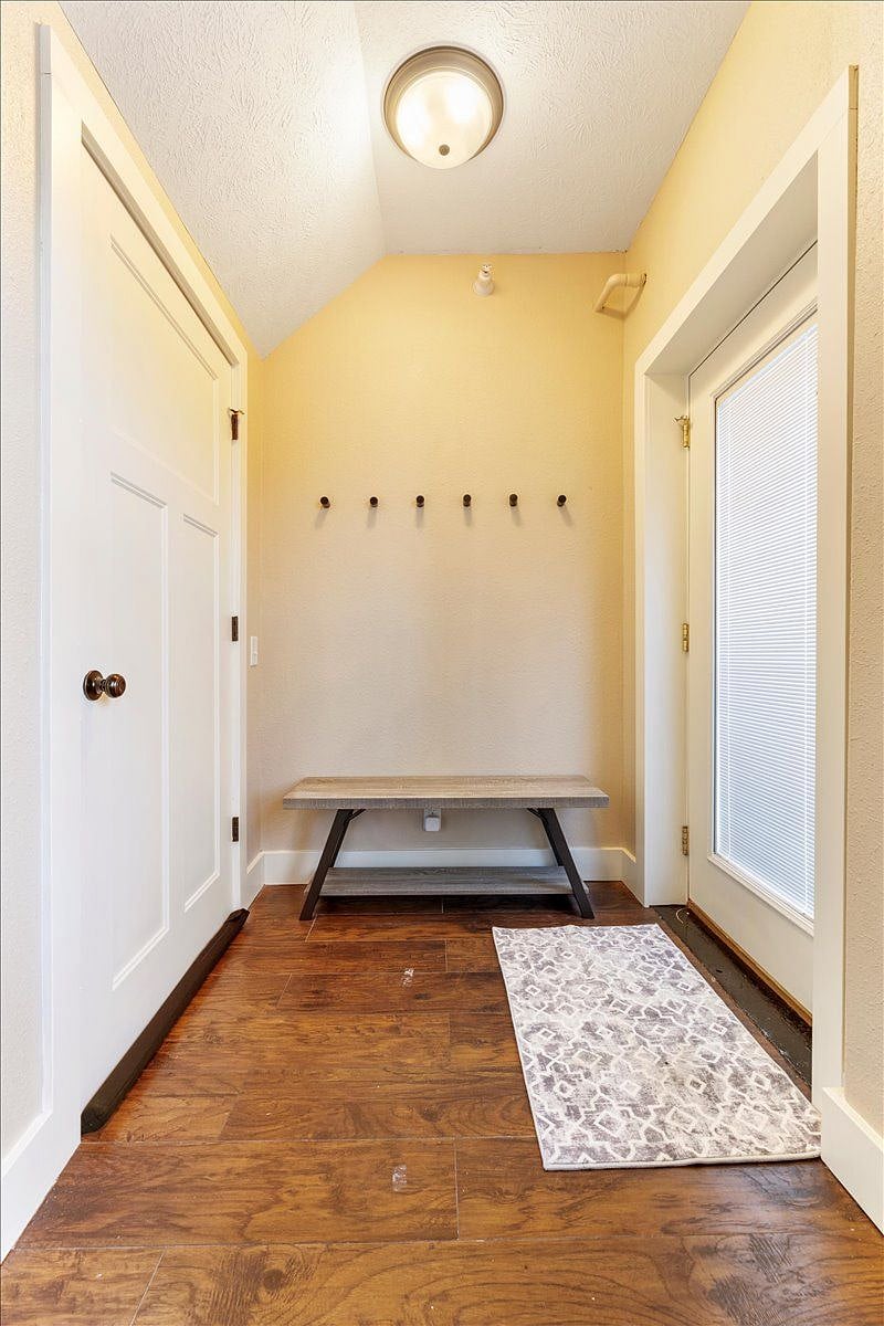 Entry: front door on right; downstairs door on left