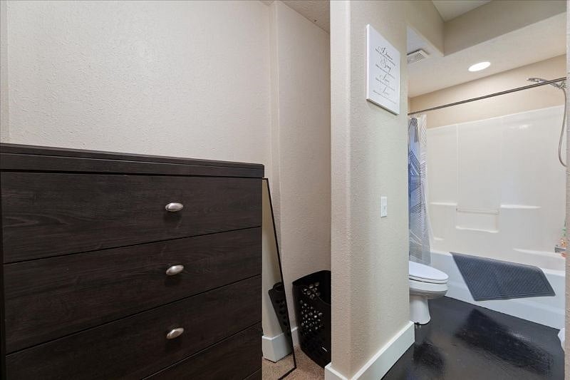 Main level master bedroom walk-in closet