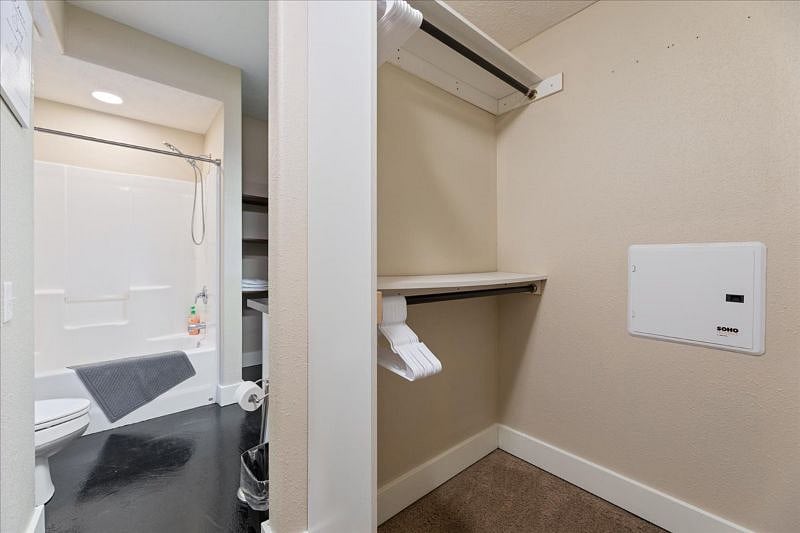 Main level master bedroom walk-in closet