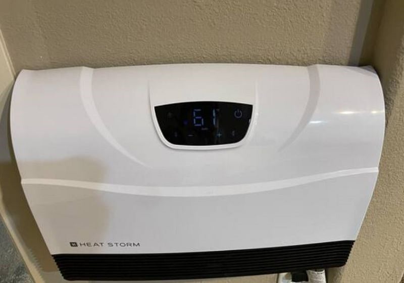 Downstairs infrared heater. Digital thermostat. Wi-Fi enabled. Can be controlled by remote or app on your phone from anywhere.
