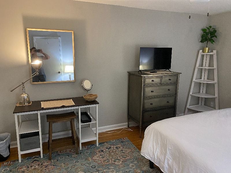 Bedroom-king bed, storage closet & dresser, desk/vanity combo, king be & ceiling fan
