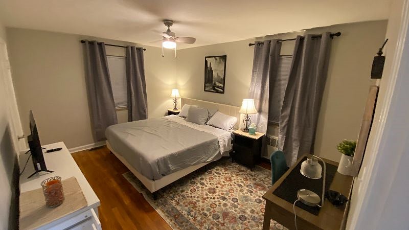 Bedroom 1- King bed. Smart tv, black out curtains, ceiling fan. Storage closet & dresser. Desk/vanity combo.