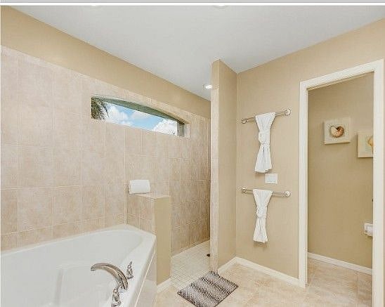 Master bath with walk in closet