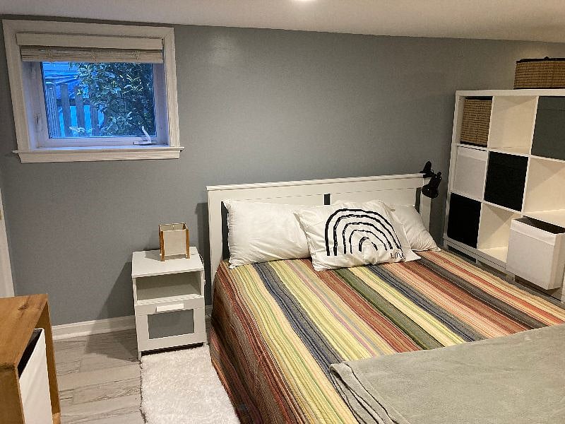 11x19 room with couch, Queen bed, side table, desk, closet, bureau, plenty of storage, remote controlled heating and A/C