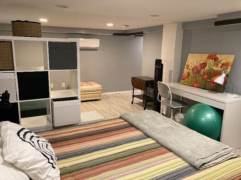 11x19 room with couch, Queen bed, side table, desk, closet, bureau, plenty of storage, remote controlled heating and A/C