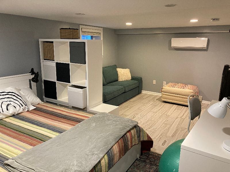 11x19 room with couch, Queen bed, side table, desk, closet, bureau, plenty of storage, remote controlled heating and A/C