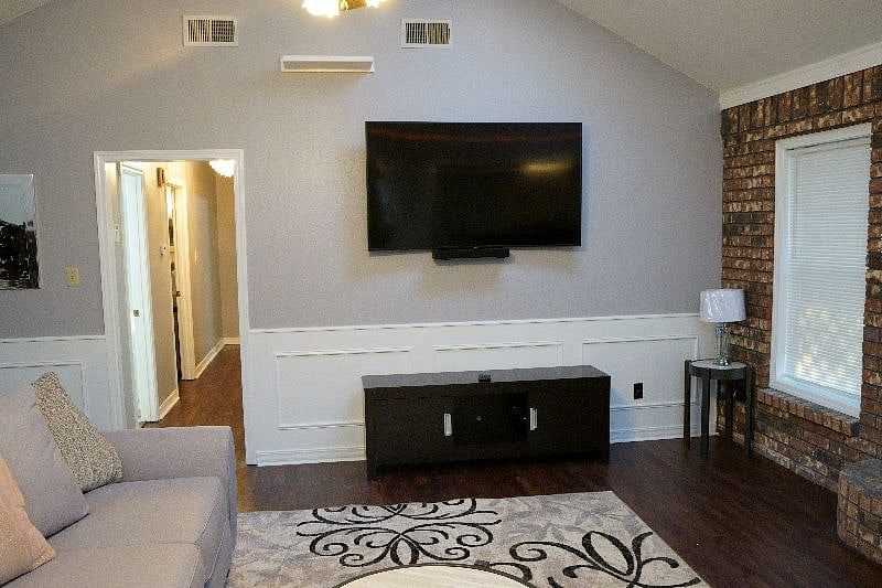 Mounted 65" Smart TV For All Your Movie Streaming Apps
