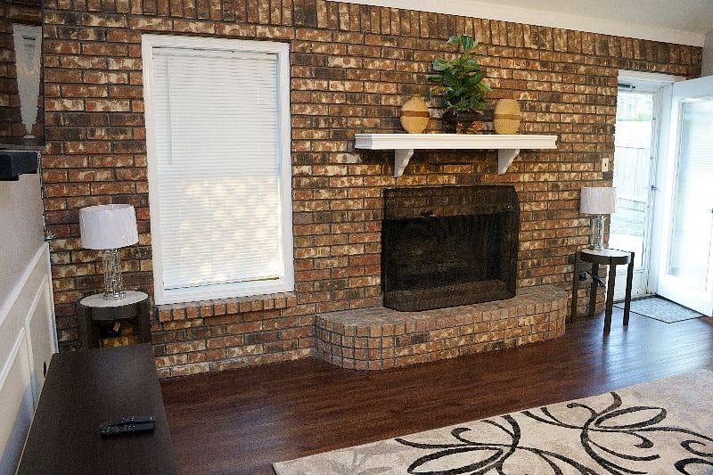 Beautiful Warm Brick Wood And Gas Burning Fireplace