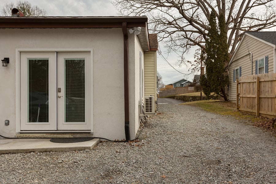 Private driveway, back yard and back entrance and patio