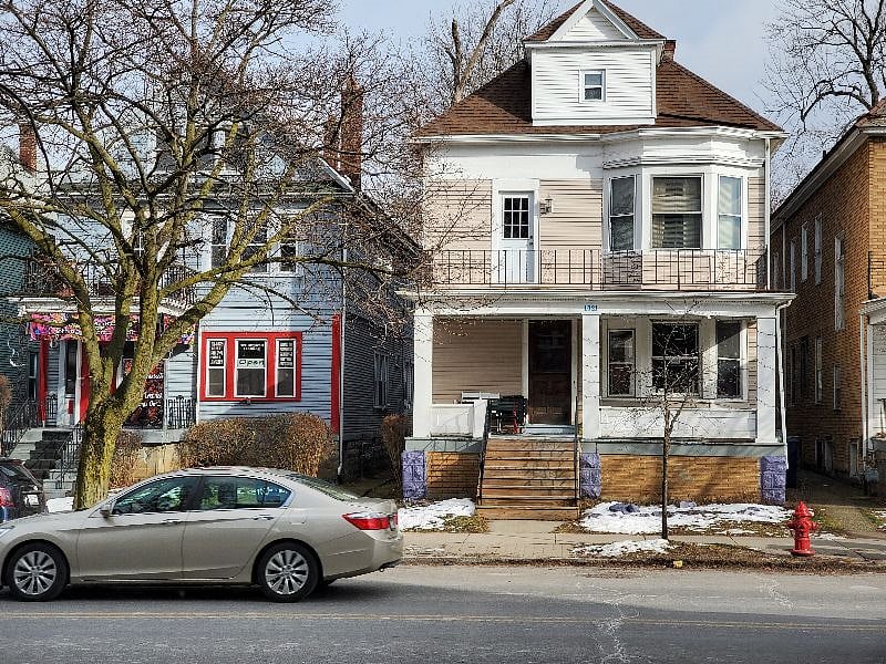 Front of the house - right on Elmwood. Apt is on the lower back.