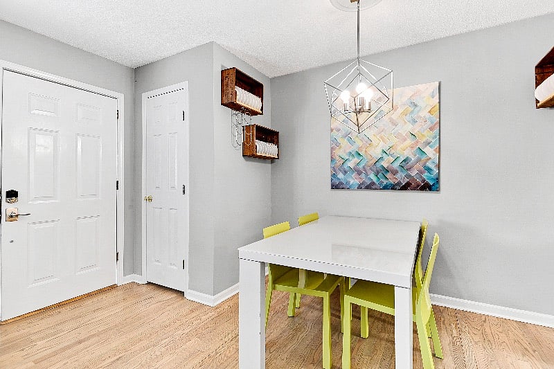 Dining area easily accommodates 4+ and high chair located in hall closet. 
