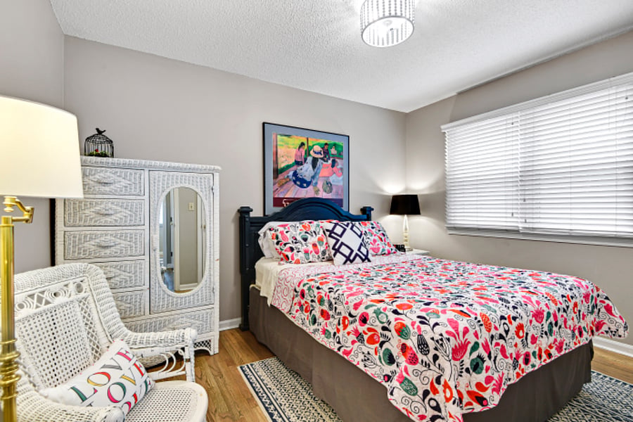 Second bedroom with queen size bed and single closet.
