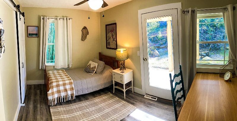 Twin bedroom with adjustable work desk