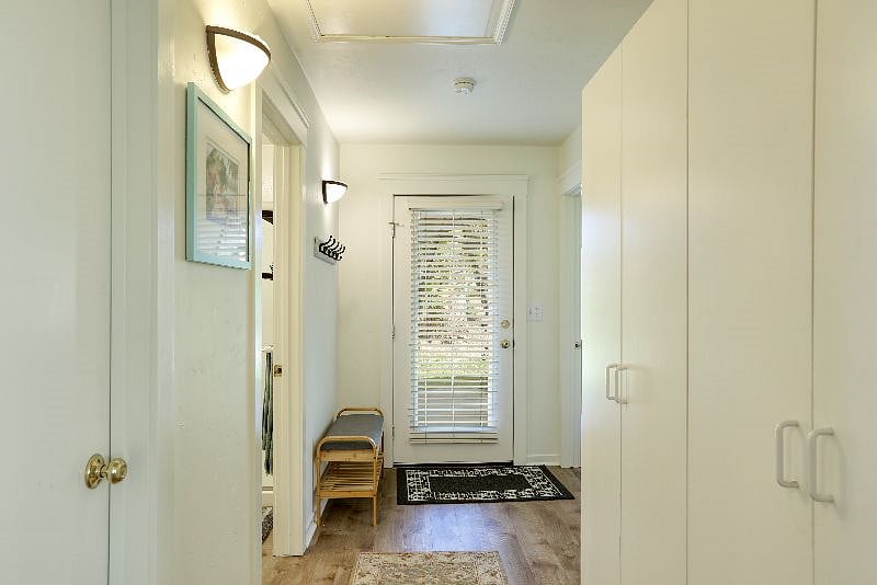 extra wide hallway with storage