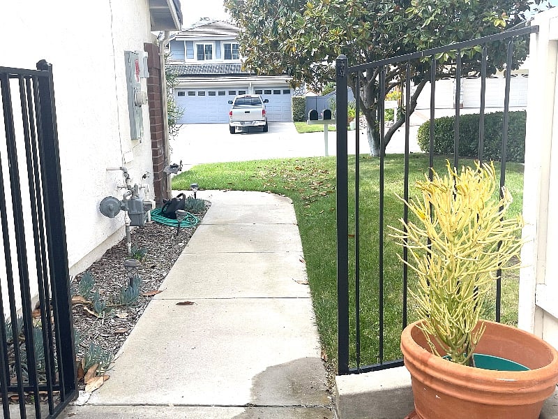 Side walk to courtyard and entrance. 