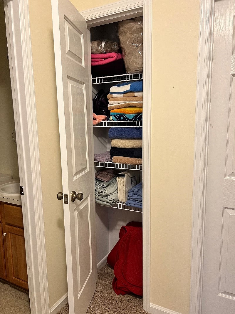 Hall closet with towels and linens