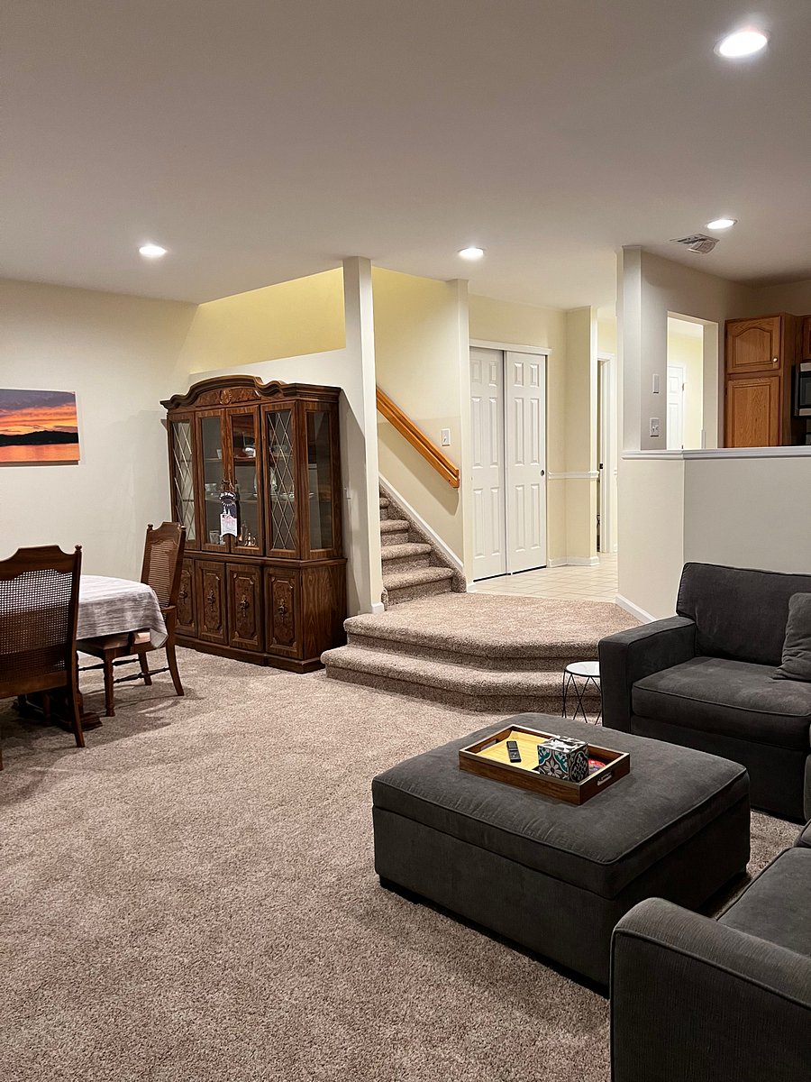 looking from living room TV area towards dining and staircase 