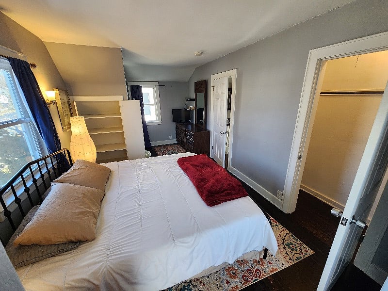 King Bedroom,
Closet space, hangers provided
Wall cabinet for extra storage.
TV on dresser.
