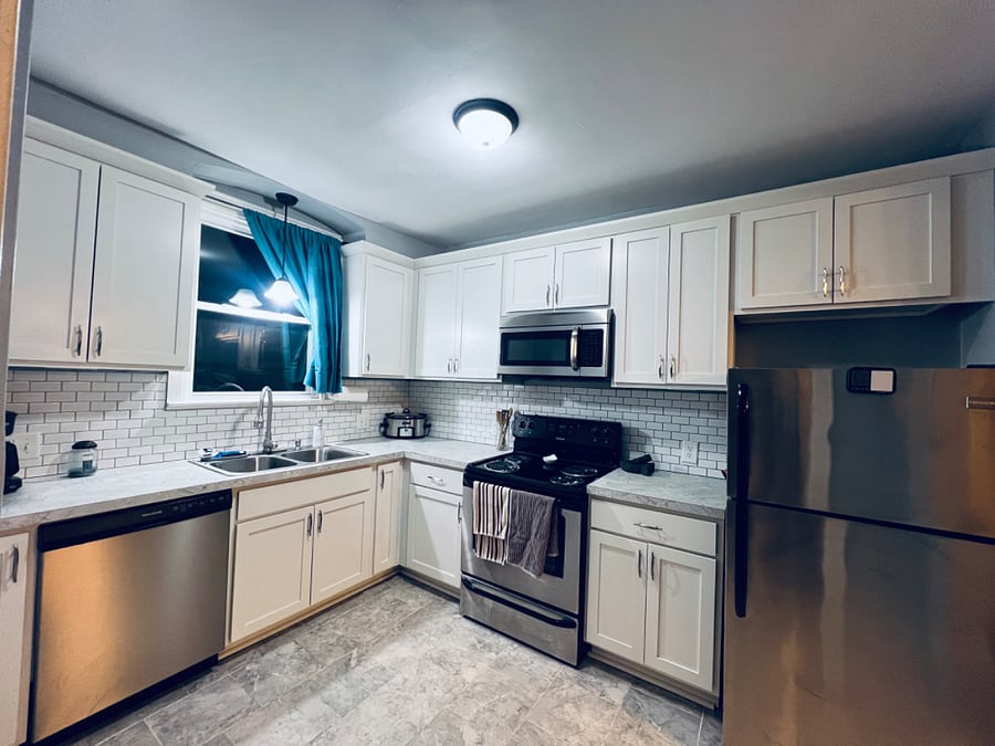 Fully stocked kitchen. Toaster, blender, electric handheld mixer in cabinets.