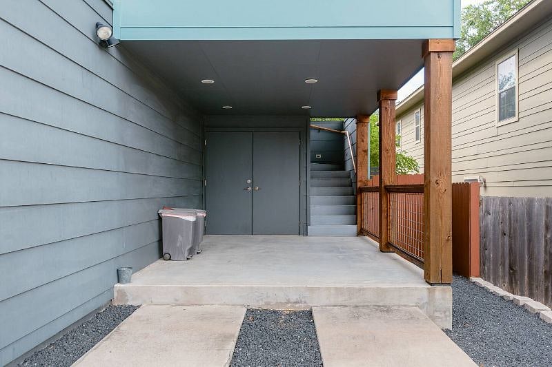 Storage are large enough for bikes behind double doors. Laundry is also located here,