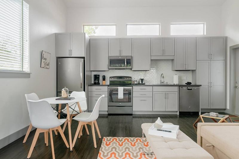Kitchen has full size appliances, plus toaster, coffee maker.