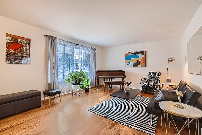 Great living room space, open and inviting and screen-free at your option (65" on rolling stand, if you just can't miss the game, or show)!