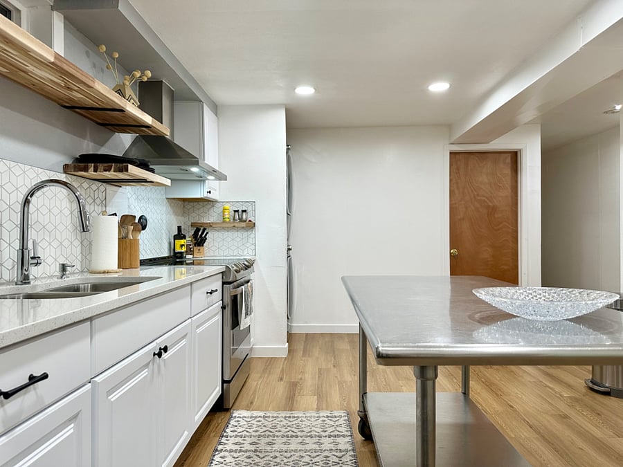 Door shown in this picture leads to a utility room with water heater and furnace. Stackable washer/dryer is all yours! 