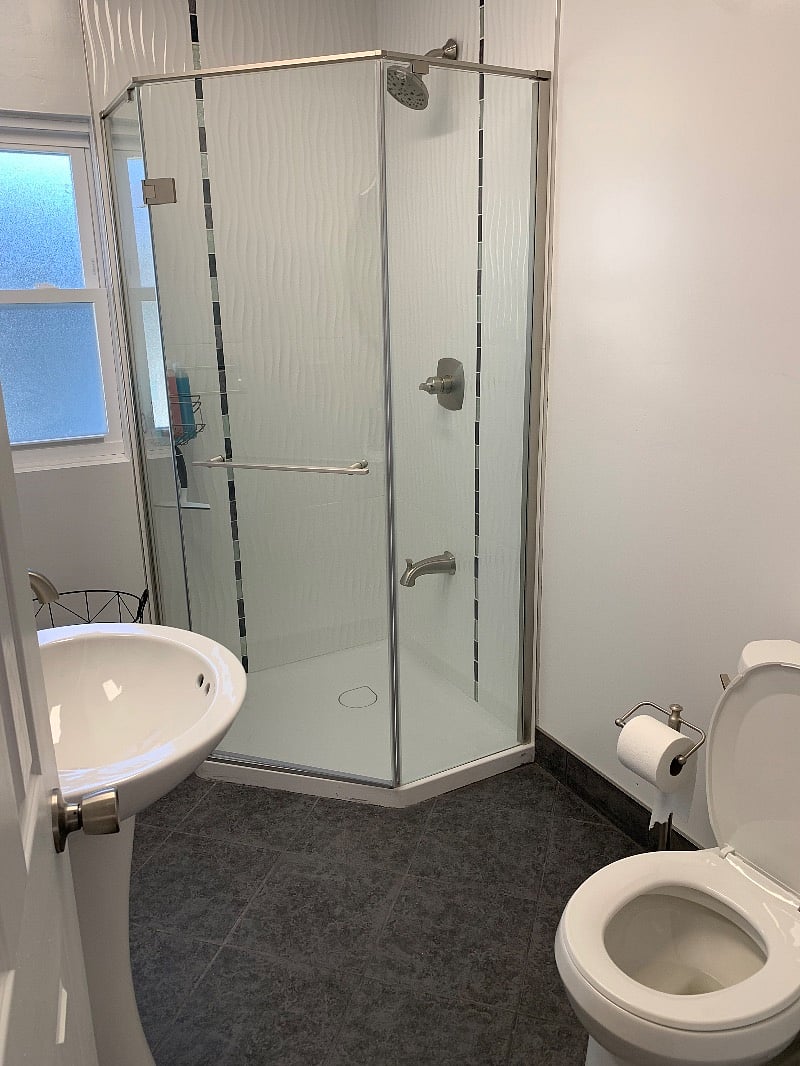 Bathroom, sink, and shower
