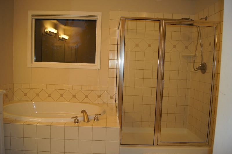 Master Bathroom with Large Tub and Shower
