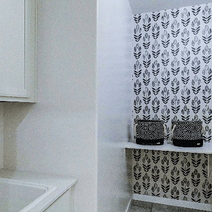 Full size laundry room with sink, top load washer and dryer.