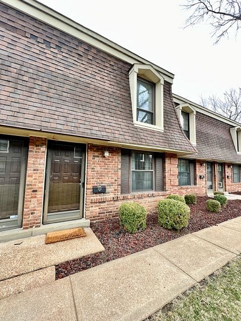 Front entrance to the townhome by way of private courtyard