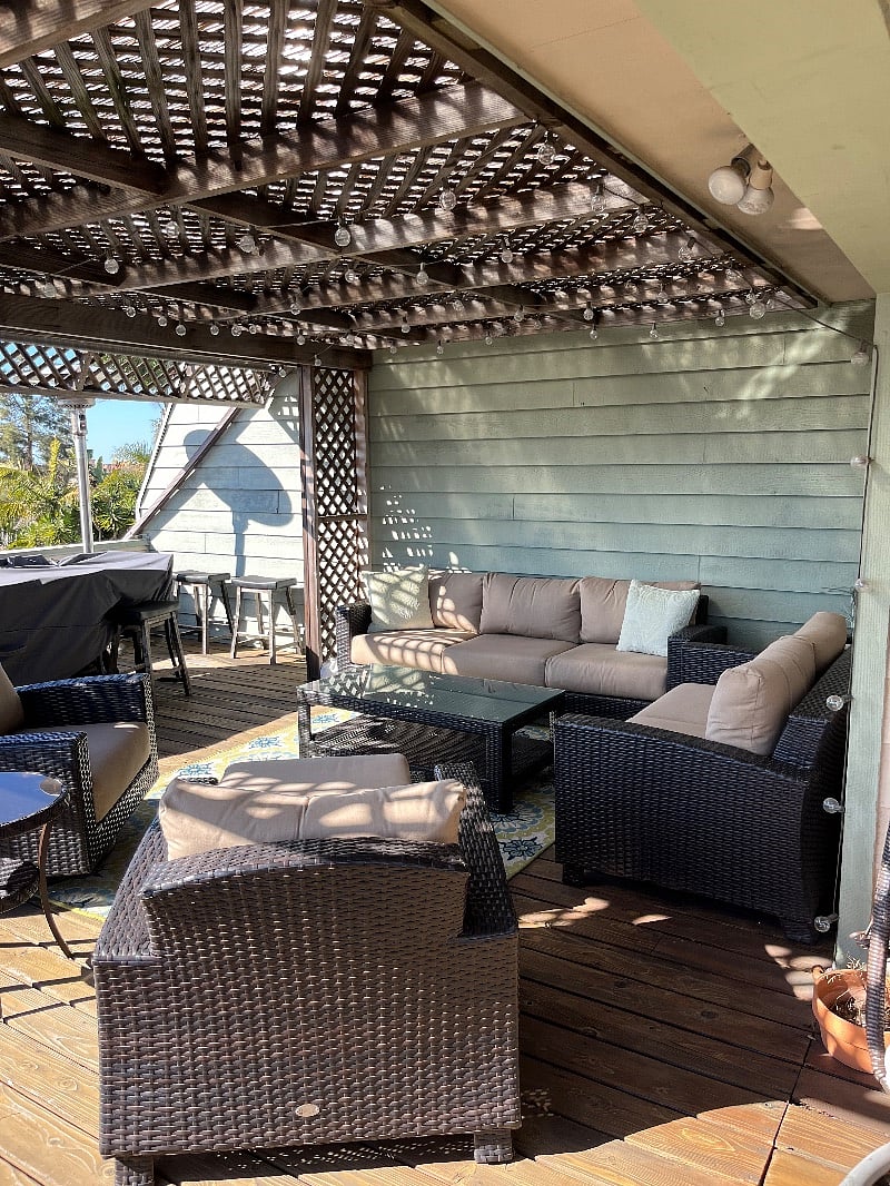Upstairs deck with furniture and heating lamp