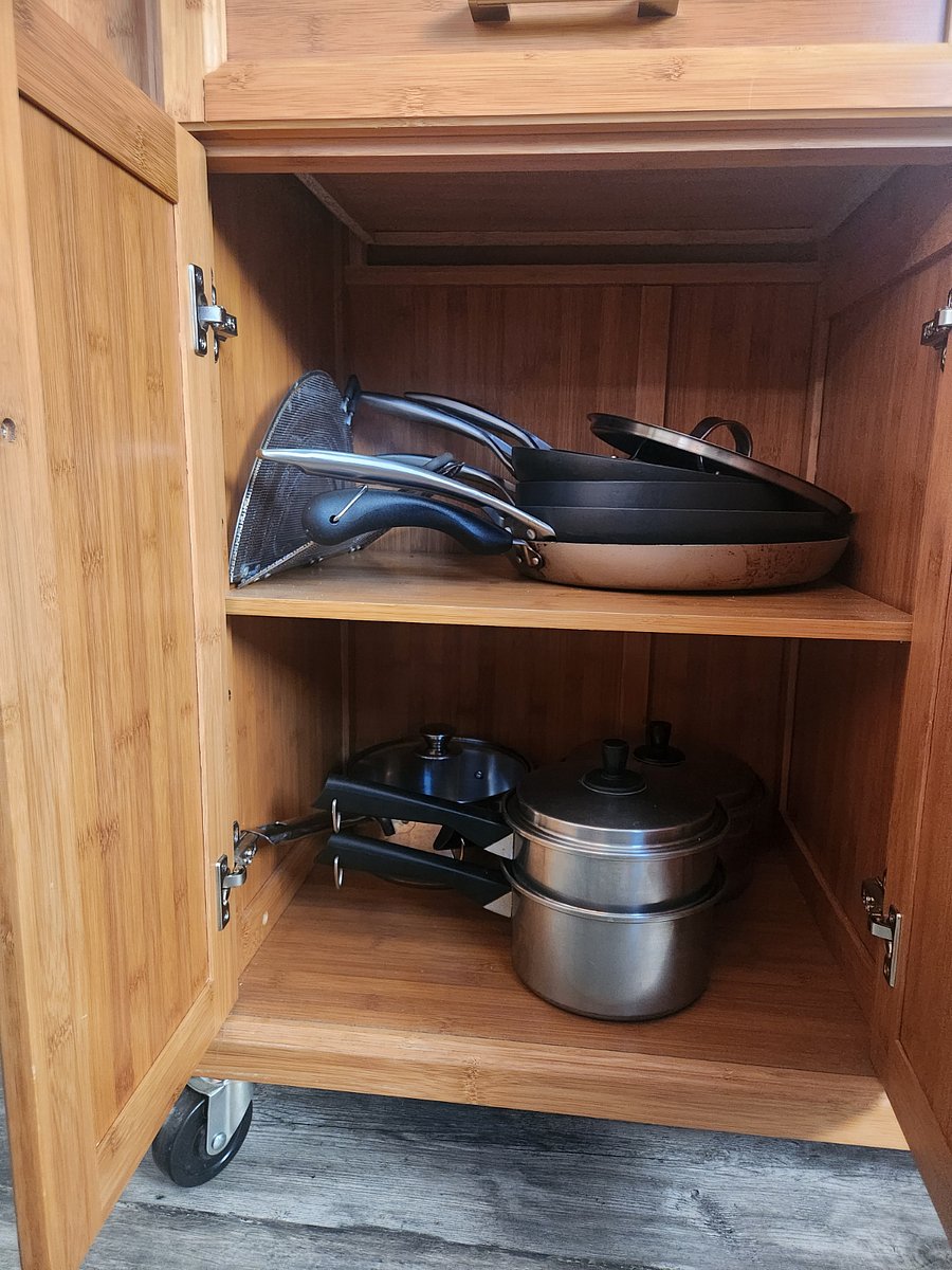 Kitchen cookware: Pots and pans located in the island