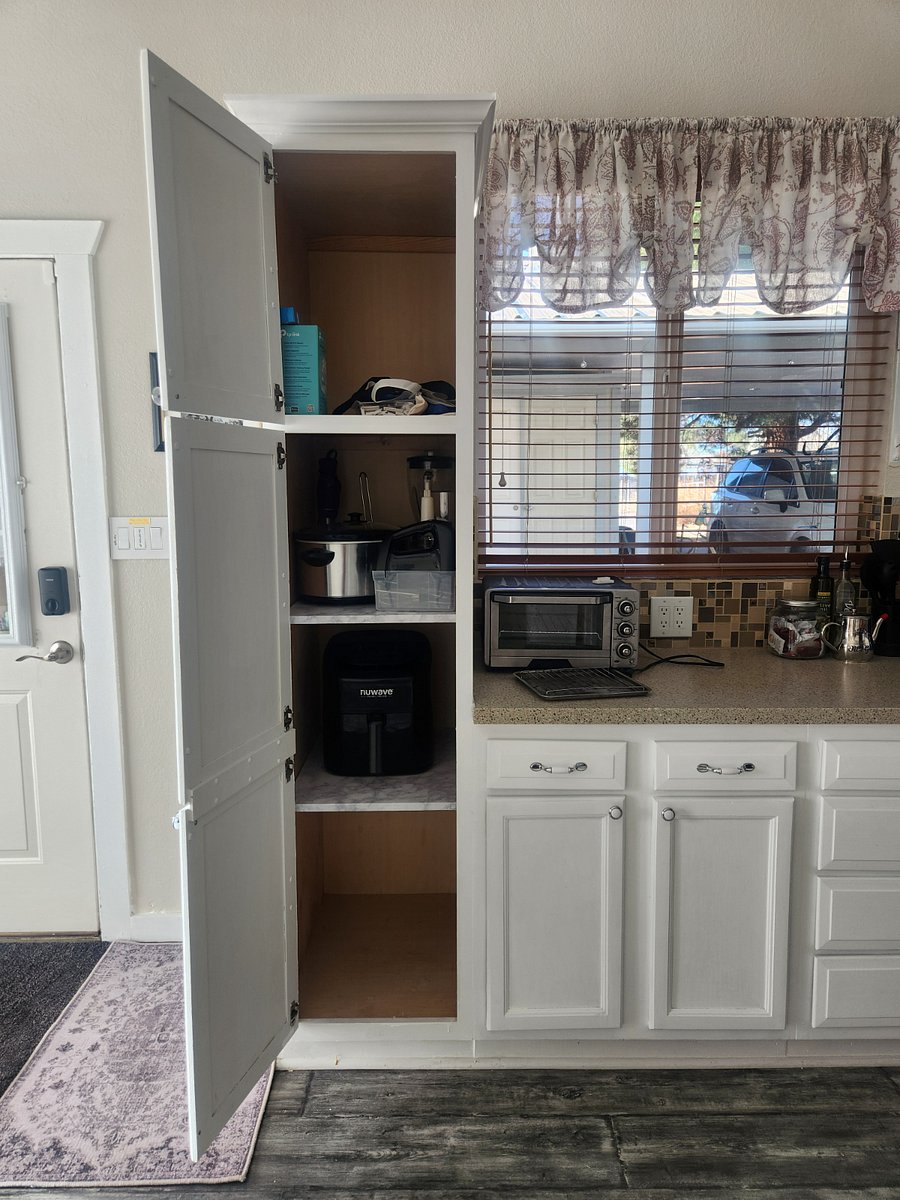Kitchen cabinet, slow cooker, air fryer, other cooking aids