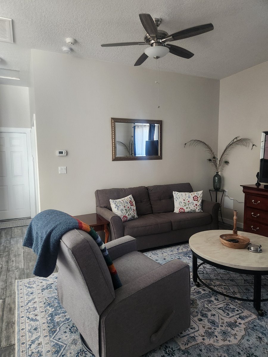 Living room view of hallway to 1st bedroom