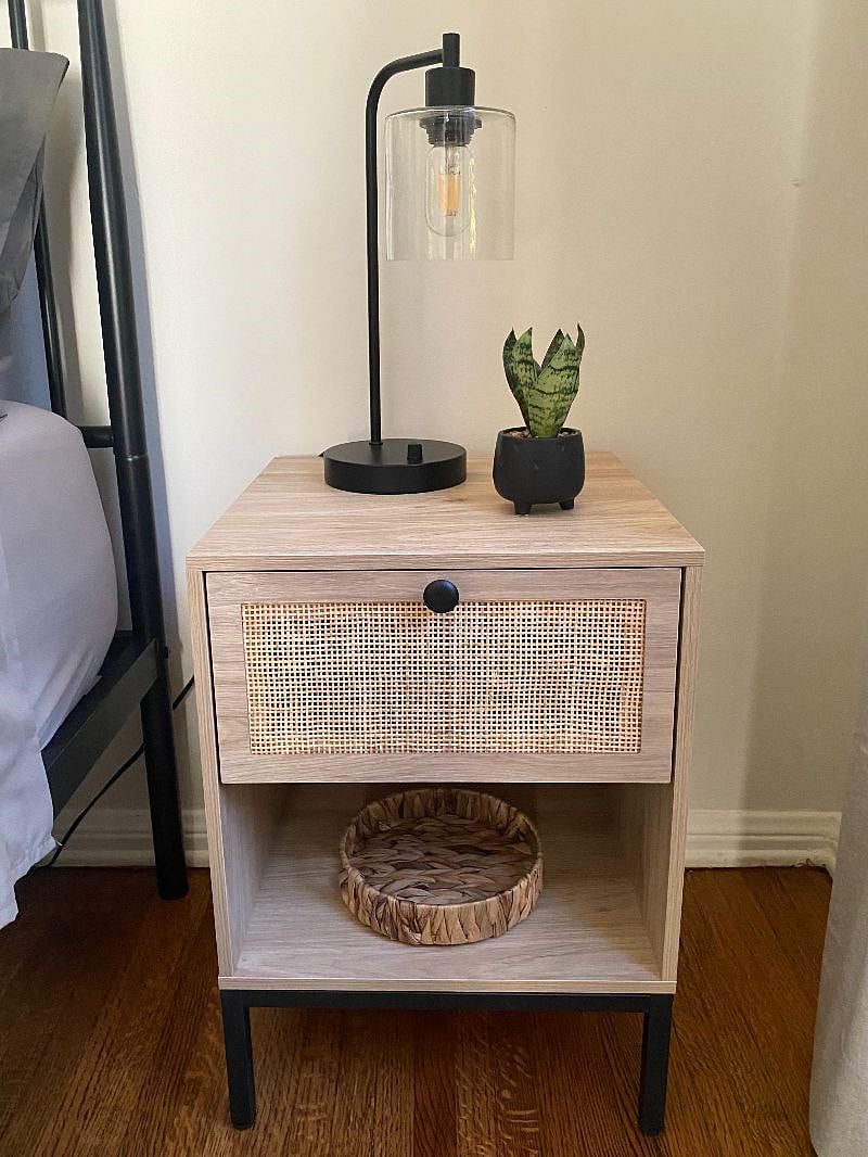Bedside table with drawer for added storage.