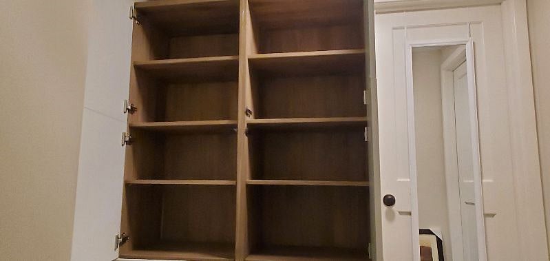 Lots of extra storage space right outside your bedroom door and next to your bathroom. If 2 dressers and a closet is not enough, half of this is yours to use. No need to clutter up your room. :) Also - extra room for coats by front door! :)