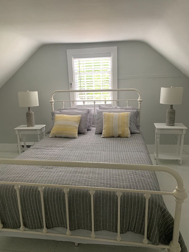 One of the upstairs bedrooms has a queen size bed.