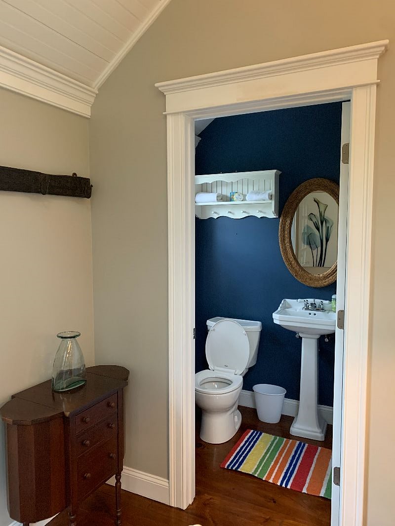 Half bath located off the dining room.