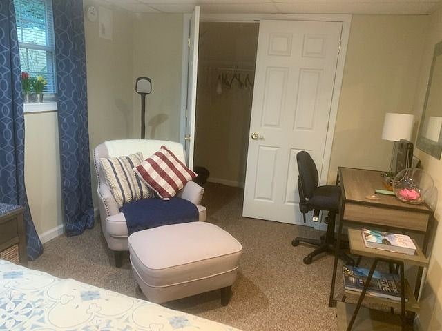 Closet and sitting area. and closet