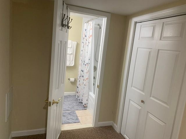 Linen closet and entry to bathroom