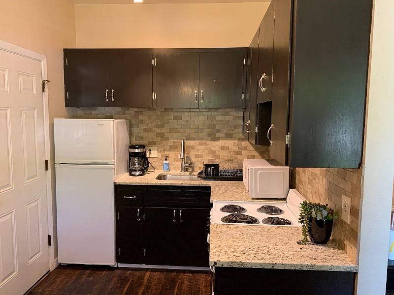Kitchen with full refridge