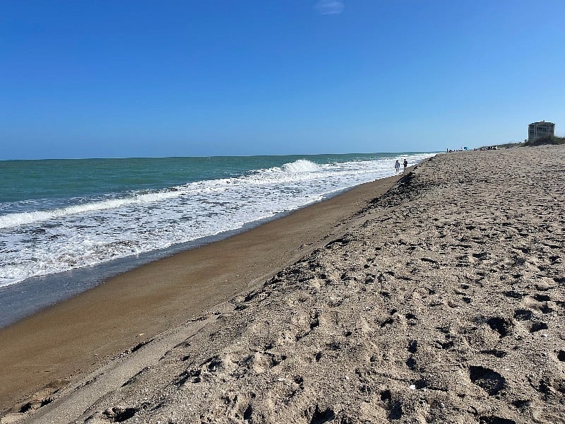Some 20+ miles of natural beach outside your door. 1 mile of private access!