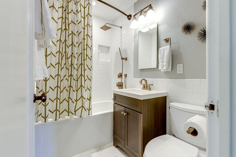 Bathroom with soaking tub, double sprayer.