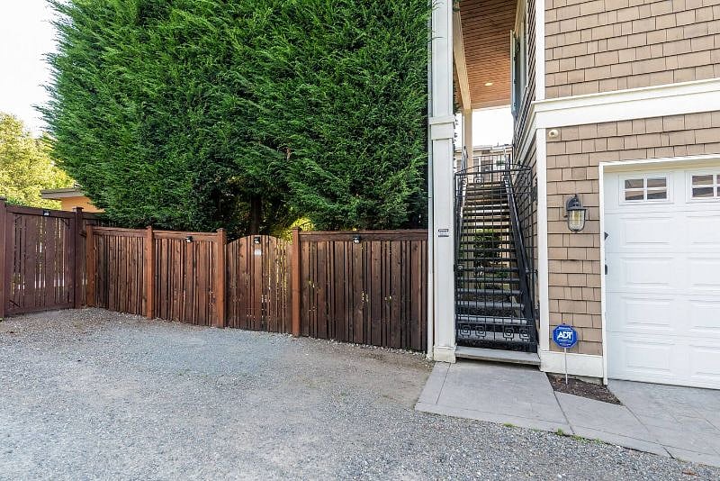 Your dedicated parking spot sits right beside the locked gate to the apartment