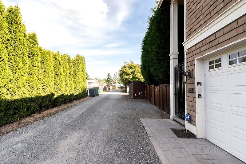 Your dedicated parking spot sits right beside the locked gate to the apartment