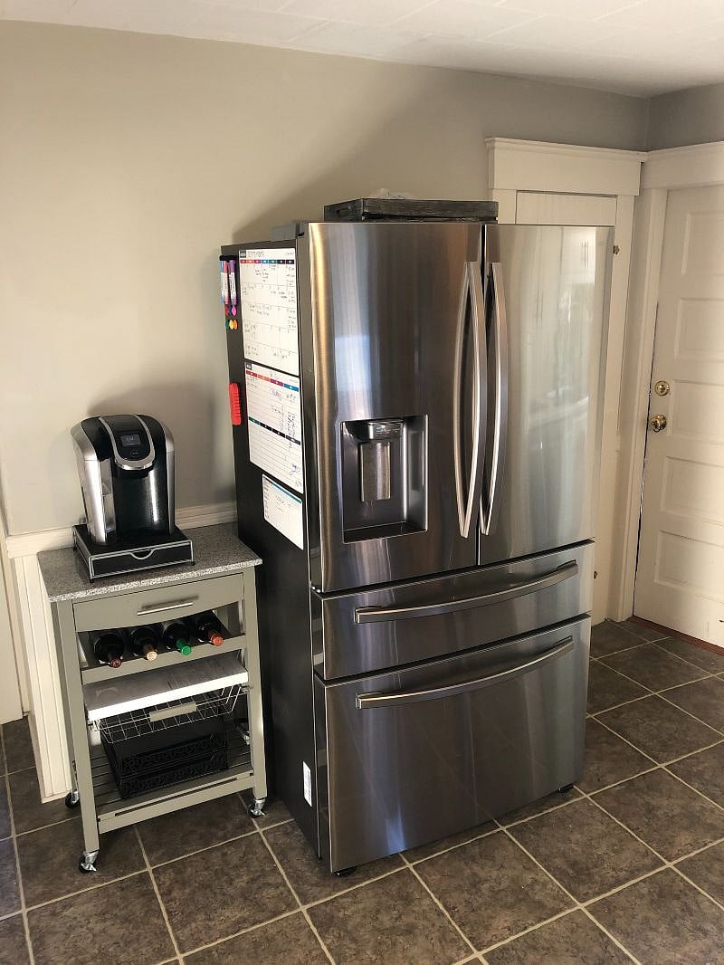 Water/ice dispensing refrigerator and K-cup coffee maker.