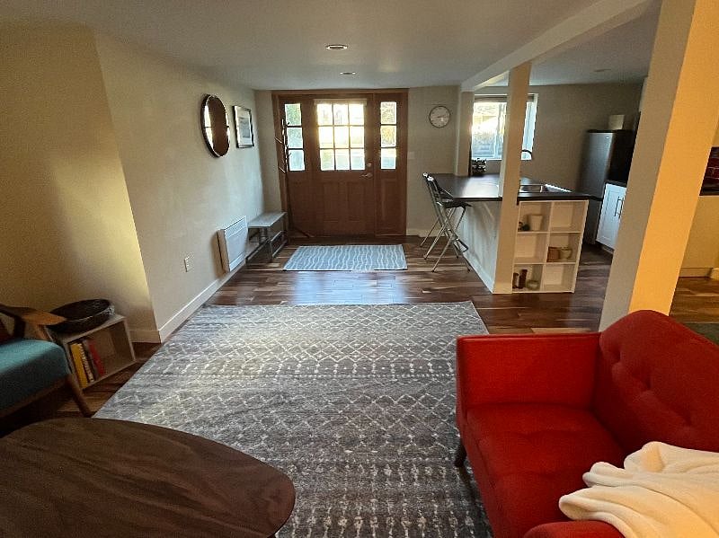 View from living room to entry and kitchen