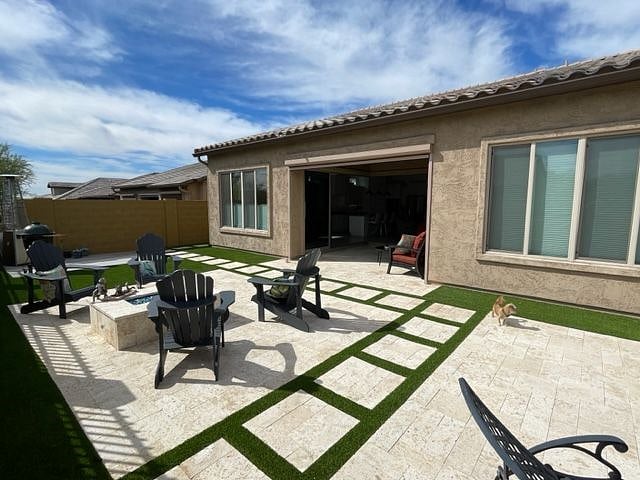 Clean, low-maintenance yard. Sand pavers are cooler on the dog's feet in the summer.